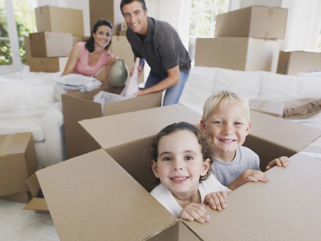 Loading furniture into a van during a Lambeth home removal