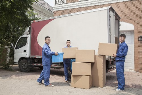 Removal team planning a move in a Lambeth street