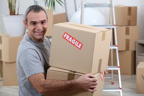 Removal team preparing a move in a Lambeth residential street