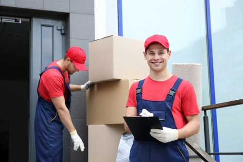Removal van loading household items for a London move