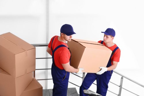 Moving boxes and household items during a Lambeth removals process