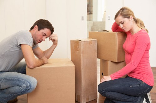 A removals team coordinating delivery and unloading at a property