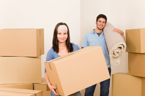 Safe and organised removals team preparing belongings for transport
