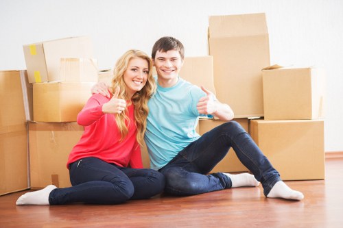 Packed boxes and furniture ready for collection during a Lambeth move